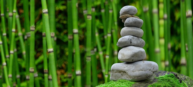 Rocks piled up to show how a small business loan consultant helps you build a successful business